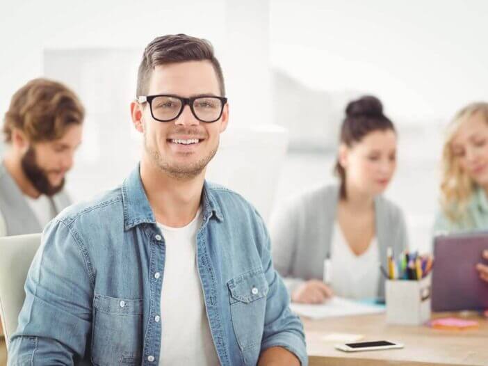 Portrait of smiling man wearing eyeglasses