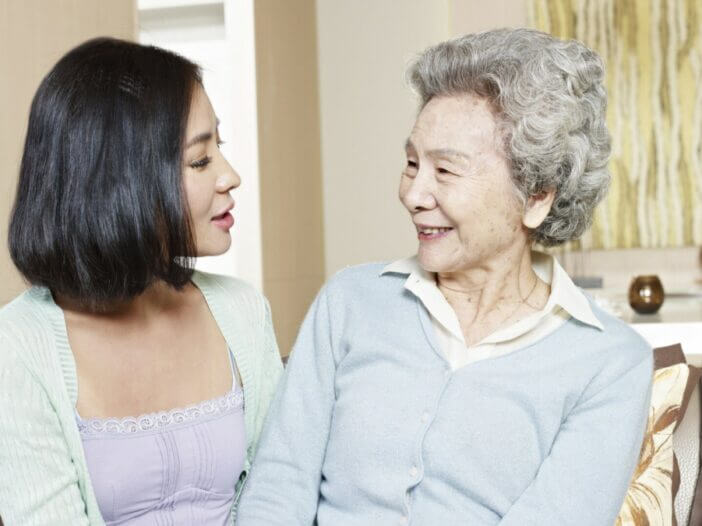 older daughter and mom looking at eachother