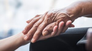 hands in caring position