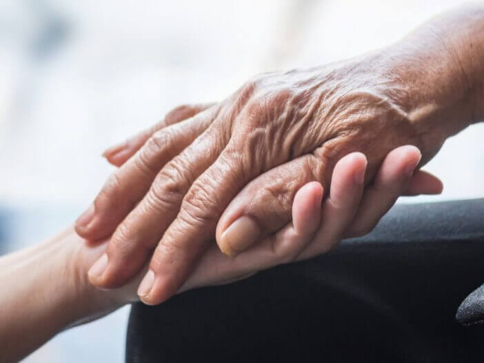 hands in caring position