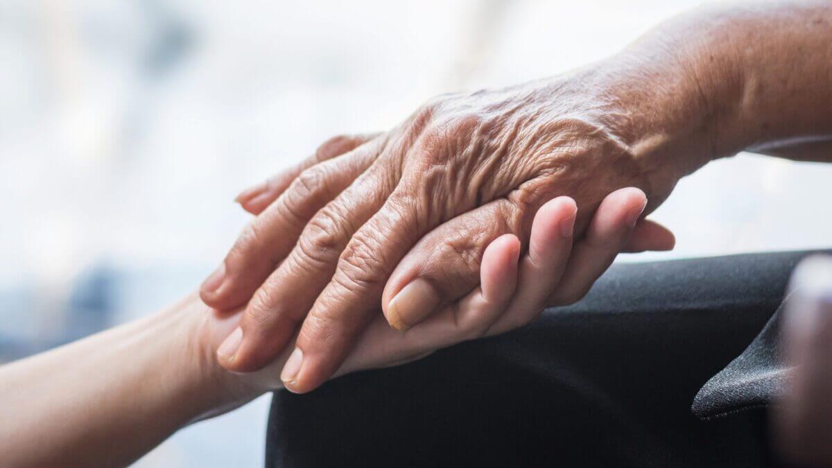 hands in caring position