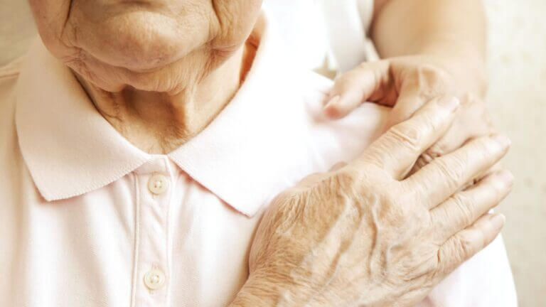 Elder is cared for by younger person