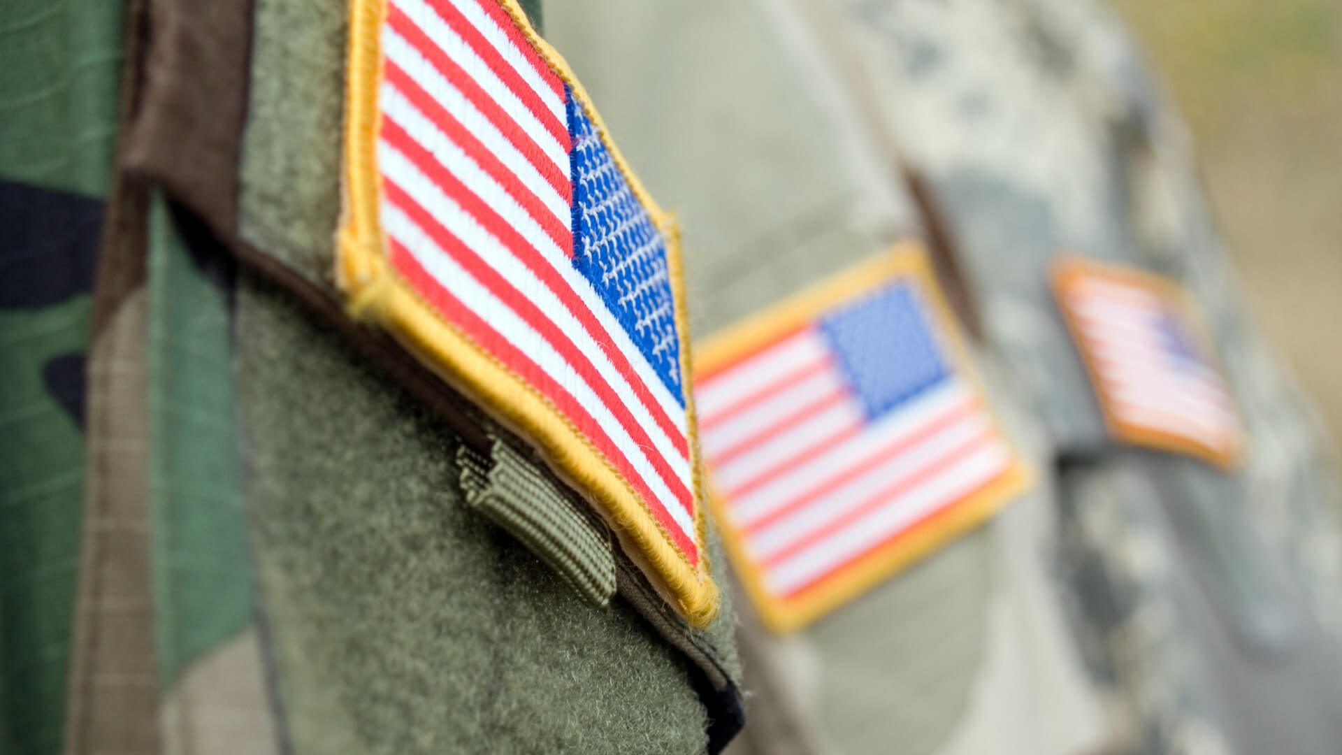 close-up of US flag on veterans uniform