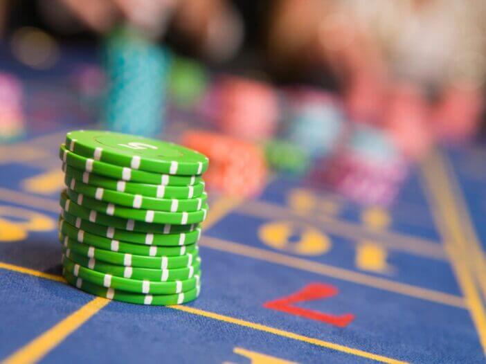 Stack of chips on roulette table in casino