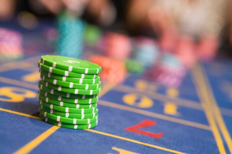 Stack of chips on roulette table in casino