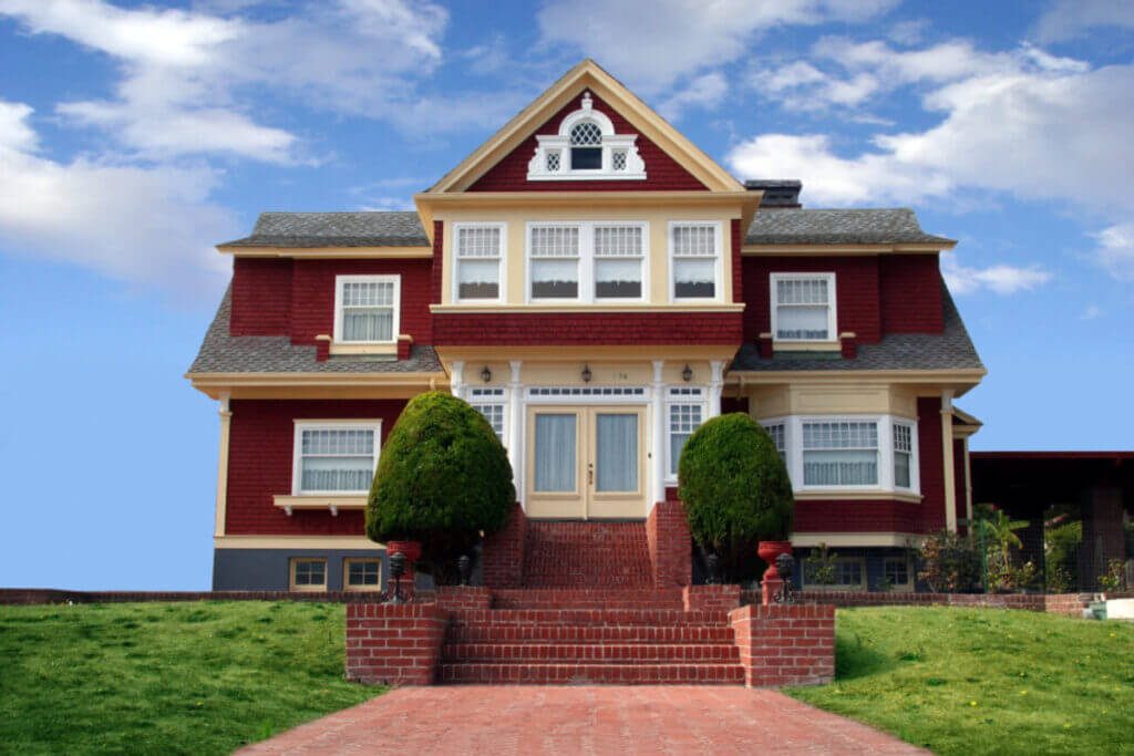 beautiful red house on blue sky