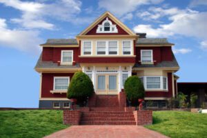 beautiful red house on blue sky