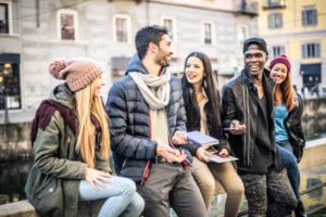 Young adult friends bonding outdoors