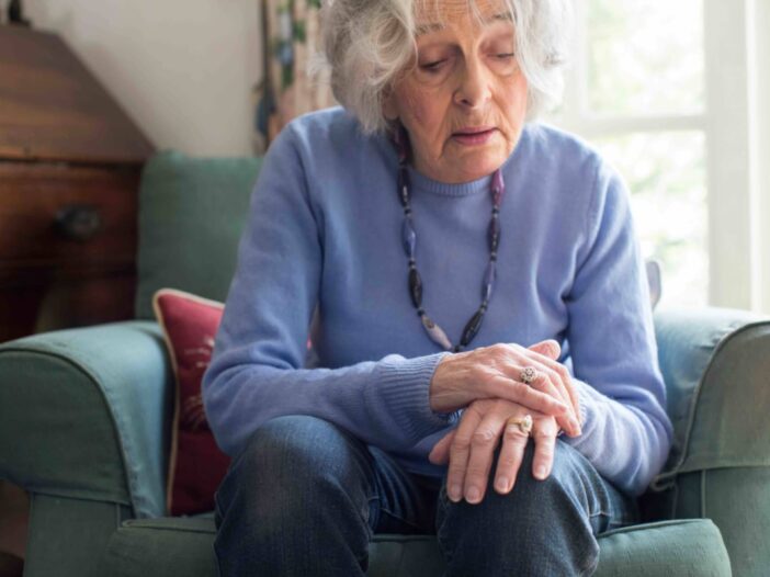 Senior Woman Suffering With Parkinson’s Disease