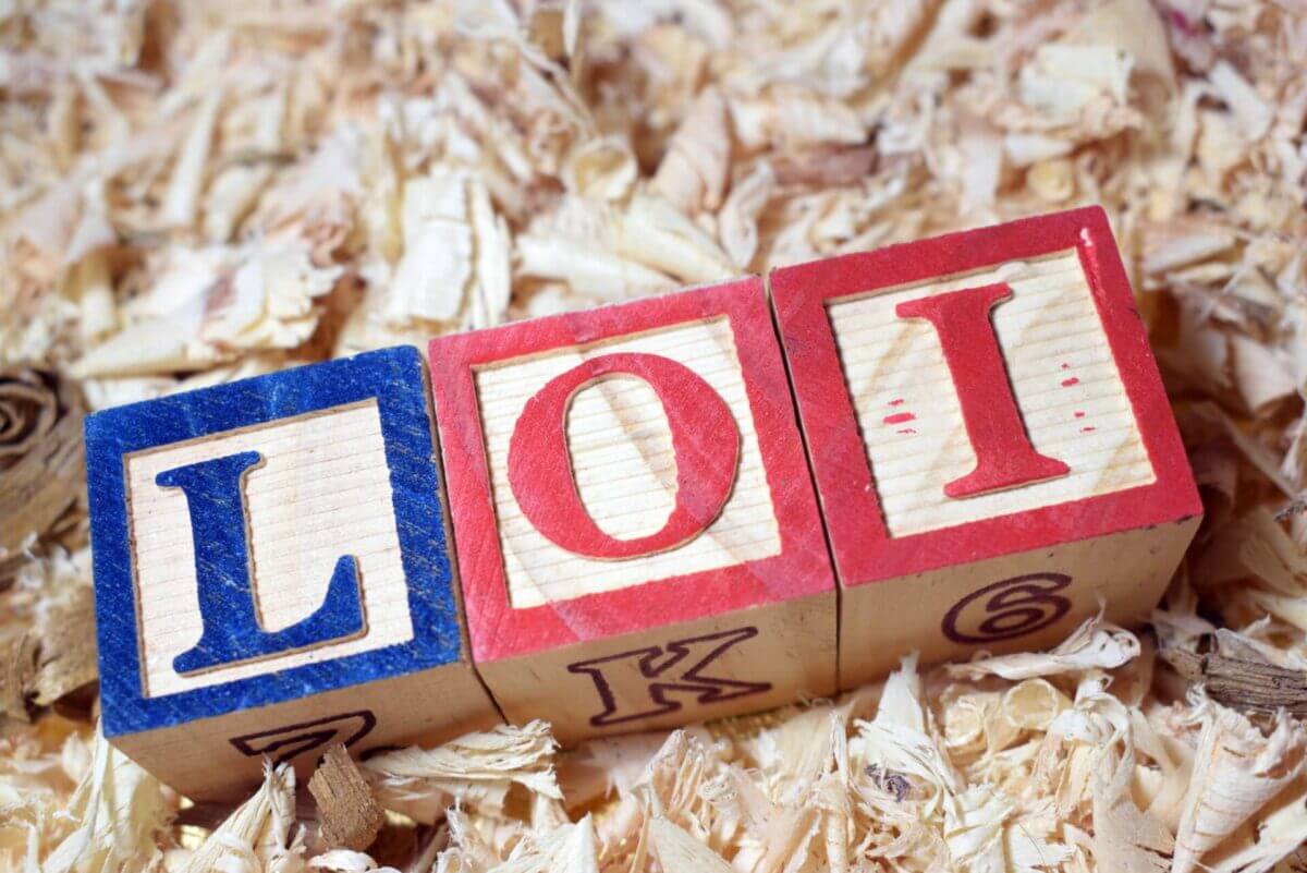 LOI spelled out on children's wooden blocks