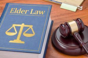 A law book with a gavel - Elder law