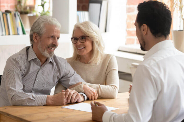 Elderly spouses during meeting with attorney