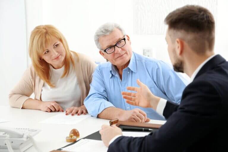older couple meeting with attorney