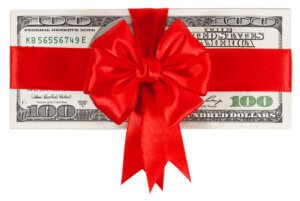 100 dollar bill with ribbon on it
