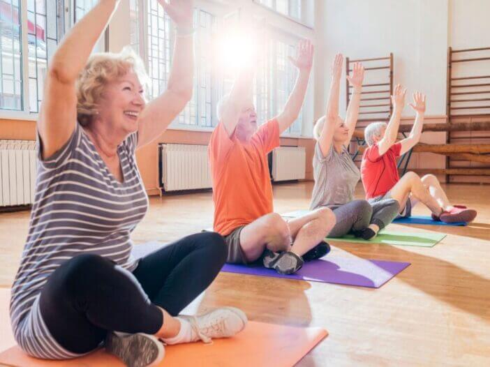 seniors doing yoga