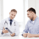male patient talking to male healthcare provider