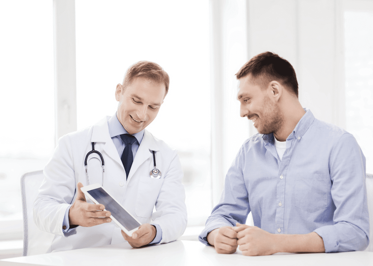male patient talking to male healthcare provider
