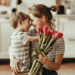 mom and child with flowers hugging