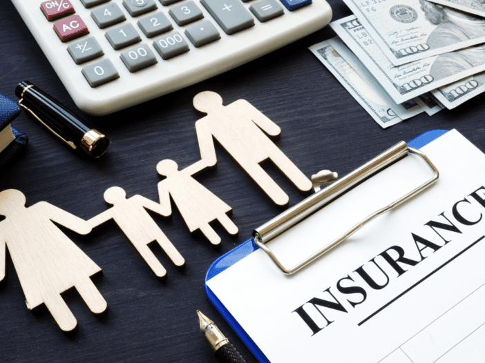 picture of life insurance clip board with family holding hands