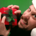 holiday scams and man stealing present