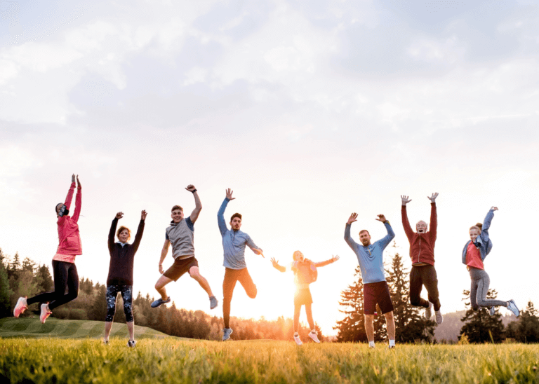 family moving and jumping for joy