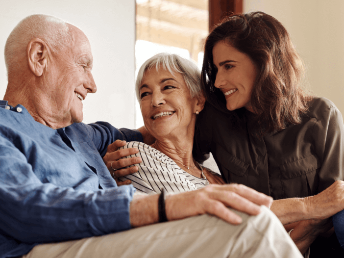 adult daughter caring for elderly parents