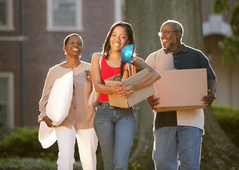 Parents dropping young adult off at college