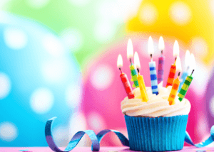 birthday cupcake and balloons