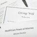 documents on a table titles advanced healthcare directive and power of attorney
