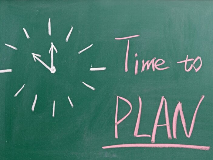 a picture of a chalkboard with a drawing of a clock and next to it says time to plan