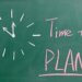 a picture of a chalkboard with a drawing of a clock and next to it says time to plan