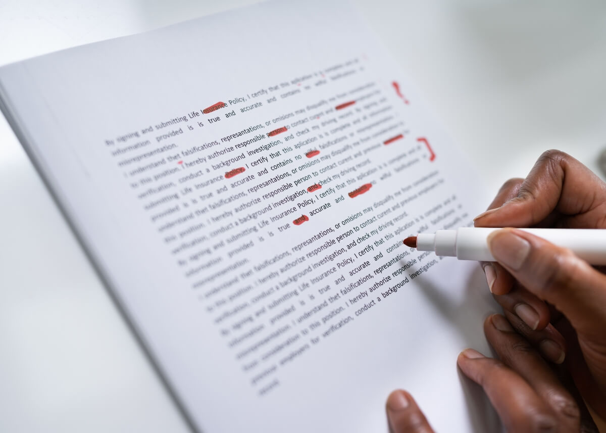 someone making corrections to a document