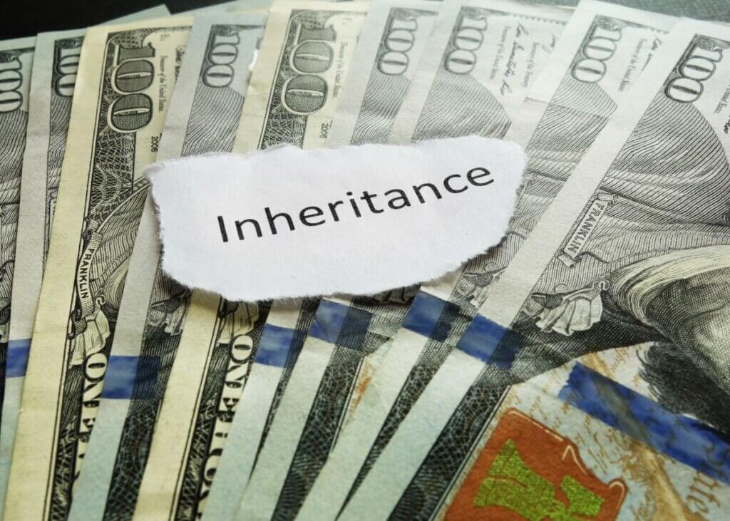 Stack of money labeled inheritance