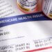 medicare documents and medicine bottles