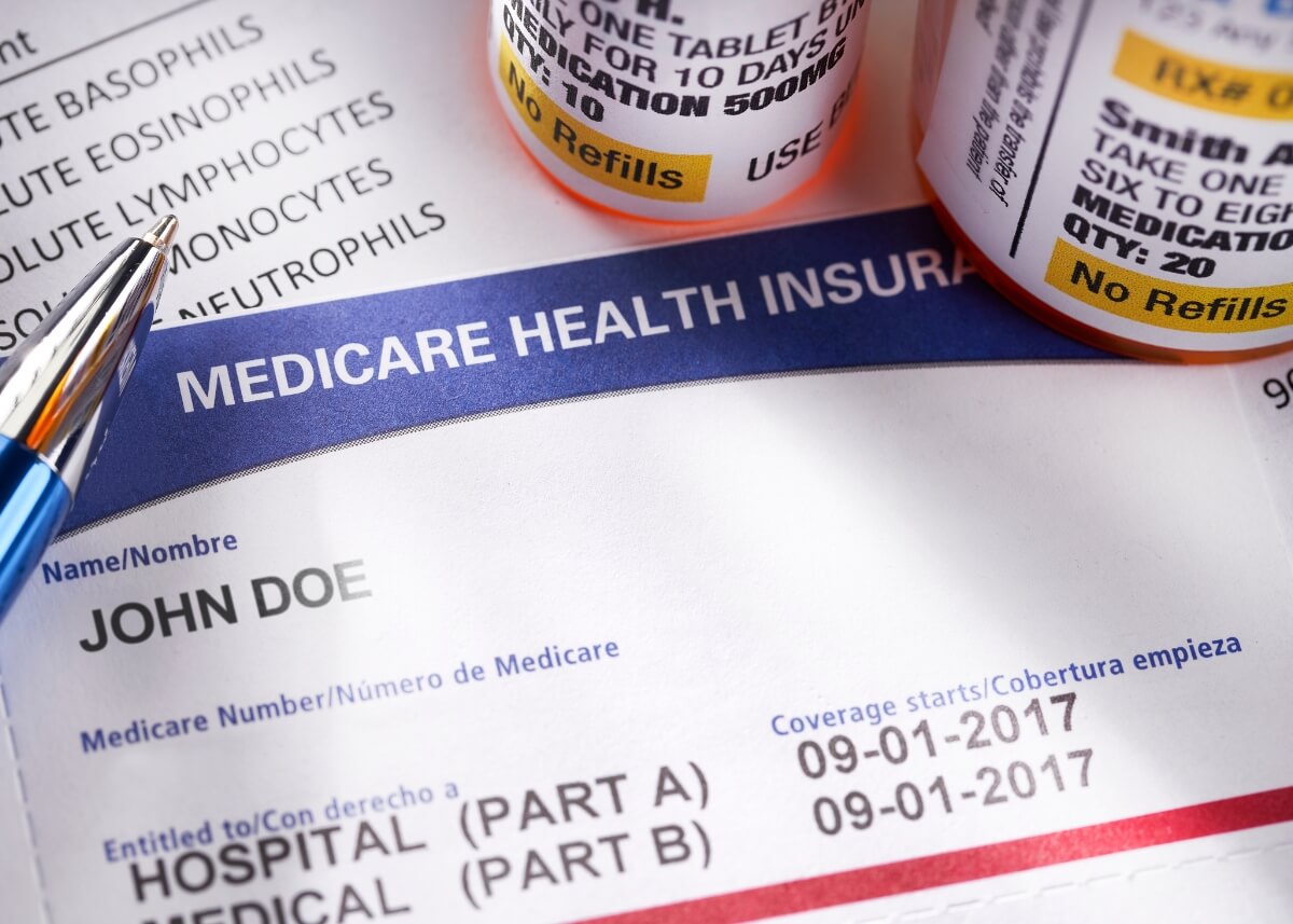 medicare documents and medicine bottles