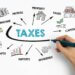 a whiteboard picture with taxes in the middle and then drawings of different things that involved taxes such as estates, businesses, etc.