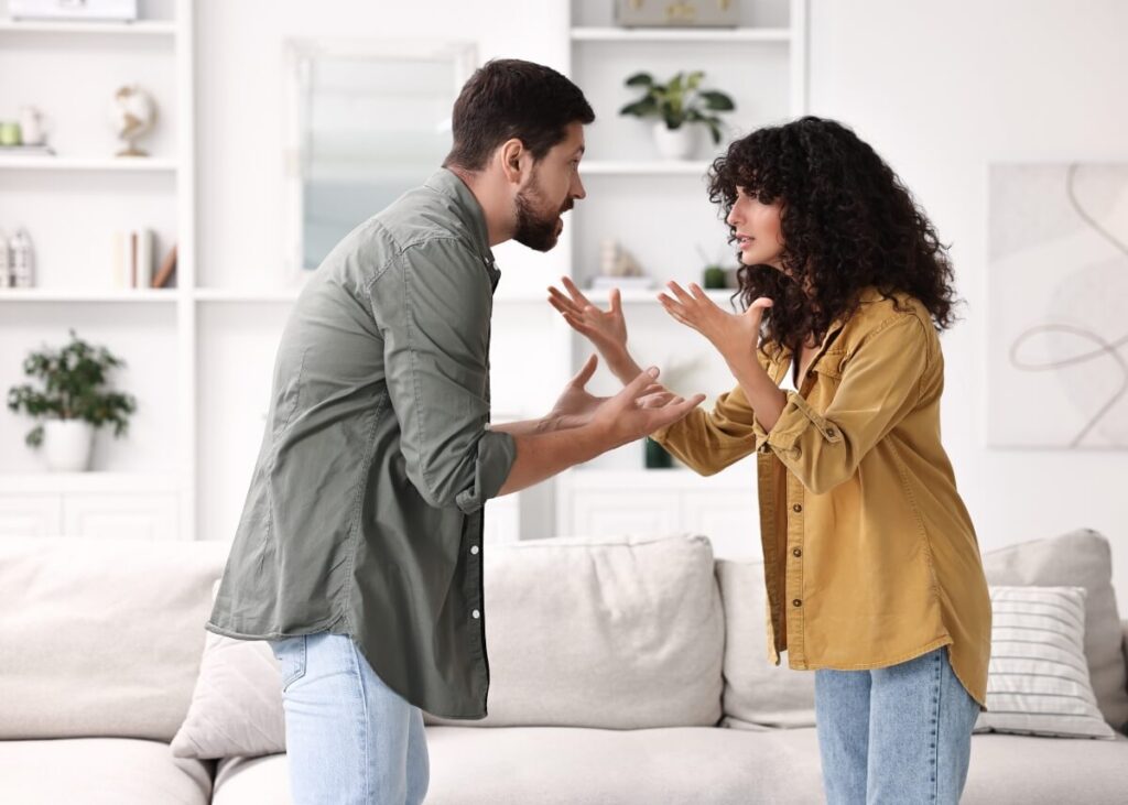 siblings fighting and arguing in the living room