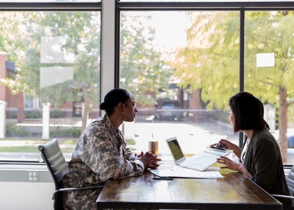 a Veteran talking to a lawyer consulting what their benefits can be
