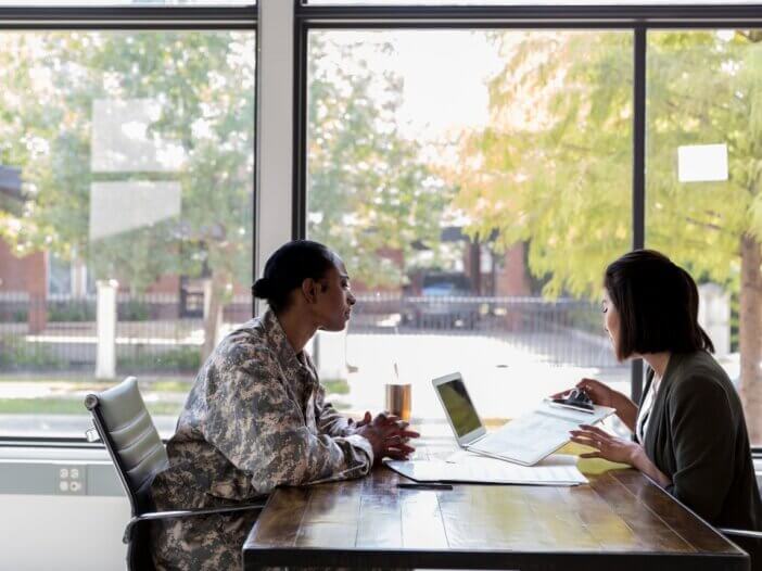 a Veteran talking to a lawyer consulting what their benefits can be