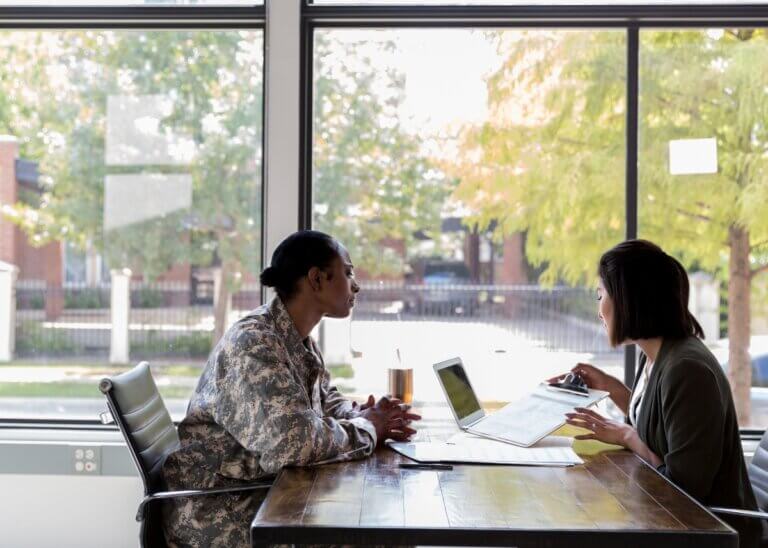 a Veteran talking to a lawyer consulting what their benefits can be