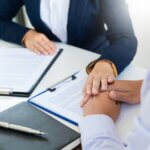 an advisor consoling their client