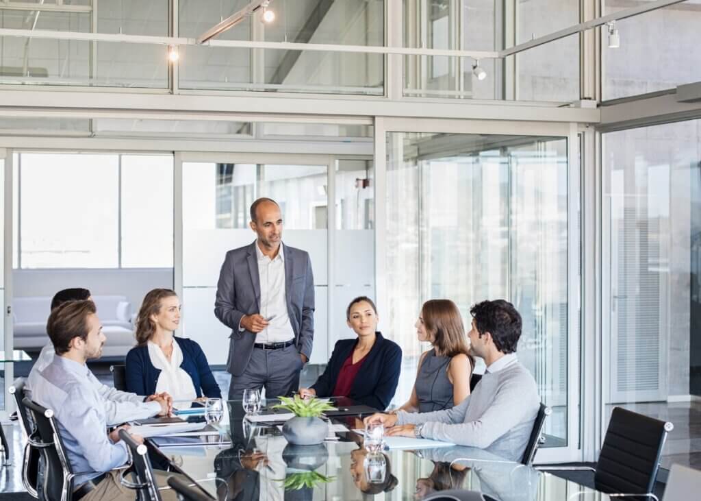 a family meeting in an office with their advisors