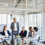 a family meeting in an office with their advisors