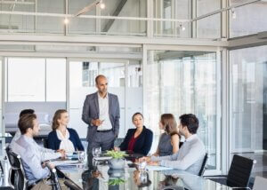 a family meeting in an office with their advisors
