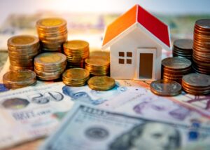 a house surrounded by money