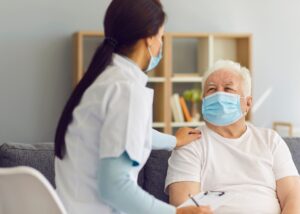 a nurse with her patient