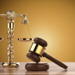 a gavel with a law being put into effect.
