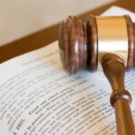 a gavel on a law dictionary