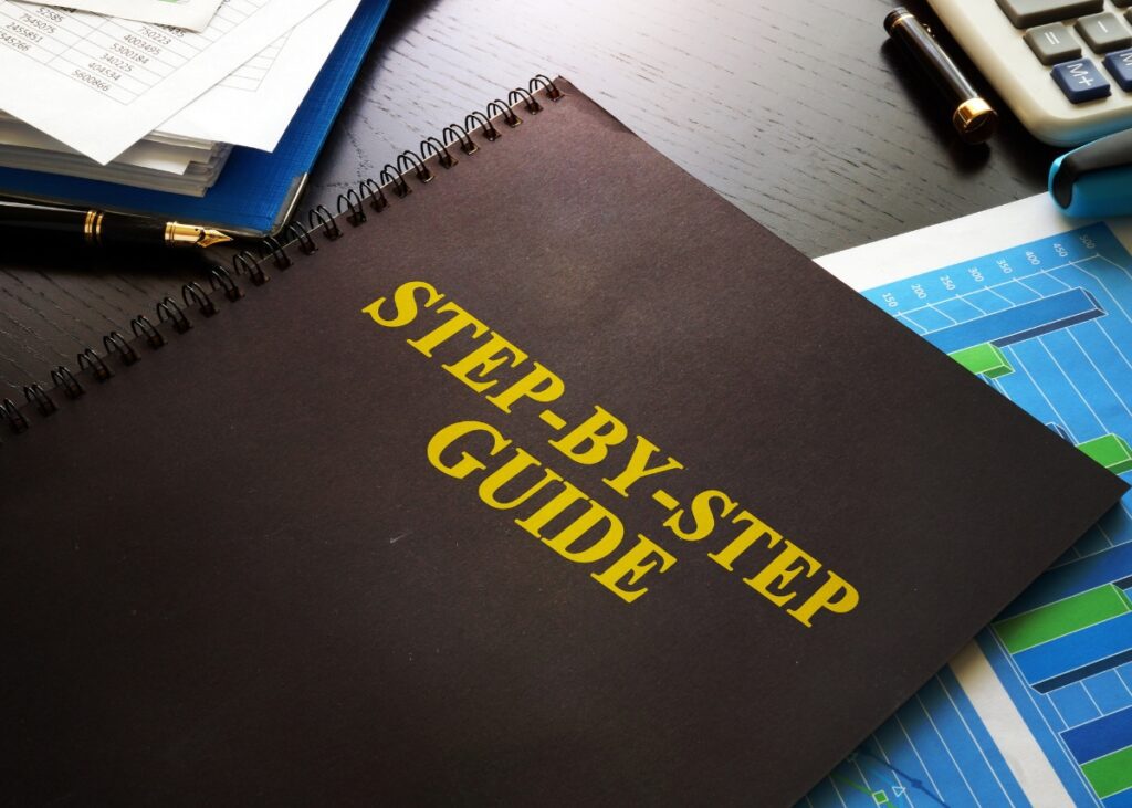 a folder that says step-by-step guide on an advisors desk