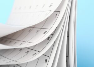 a calendar flipping to the year end for the end of year review